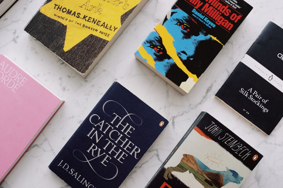 Top view of collection with famous novels with colorful inscriptions and covers arranged o
